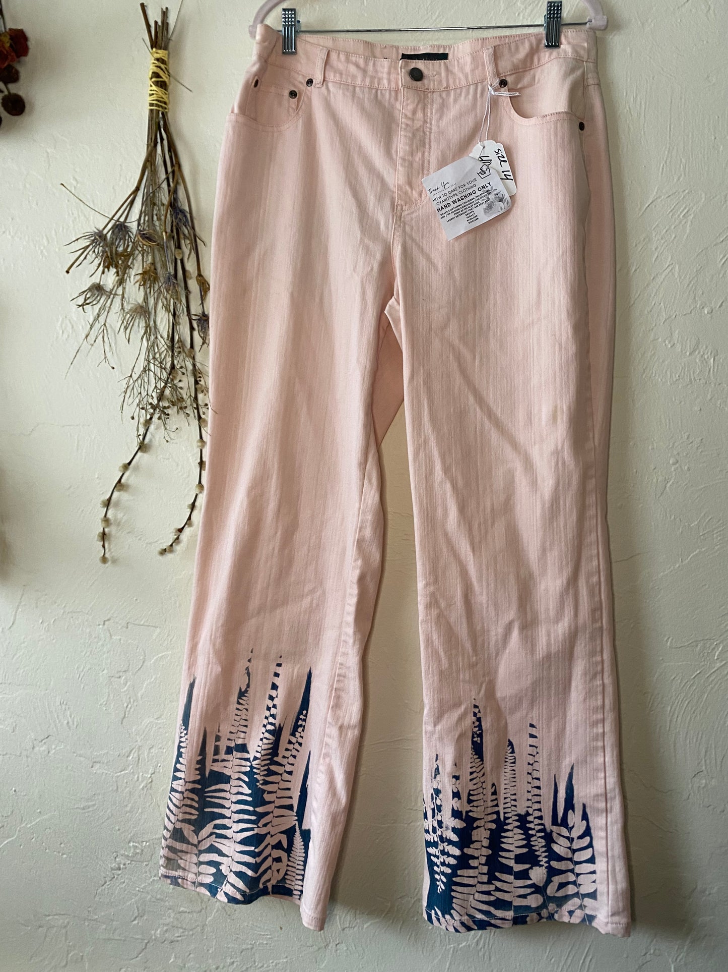 Women’s flare pink jeans size 12/14